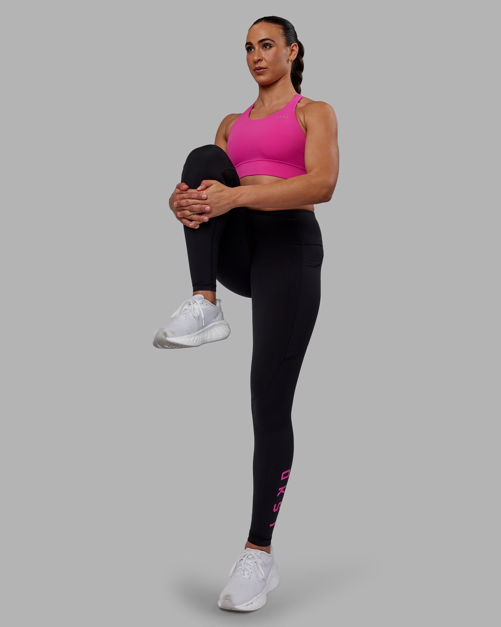 Woman wearing Rep Ultra High-Rise Full Length Legging Pockets - Black-Fuchsia Pink | Model:Sophie | Size:S