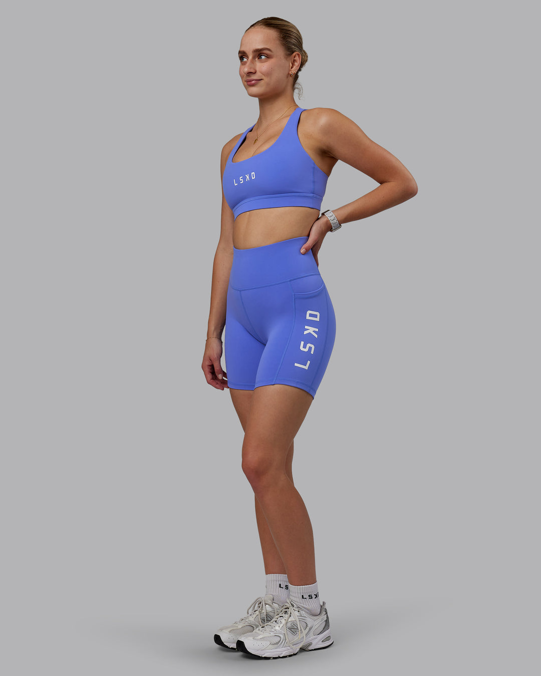 Woman wearing Rep Ultra High-Rise 6" Short Pockets - Baja Blue-White | Model:Lillie | Size:S - view 5