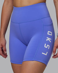 Woman wearing Rep Ultra High-Rise 6" Short Pockets - Baja Blue-White | Model:Lillie | Size:S | Thumbnail Index: 5