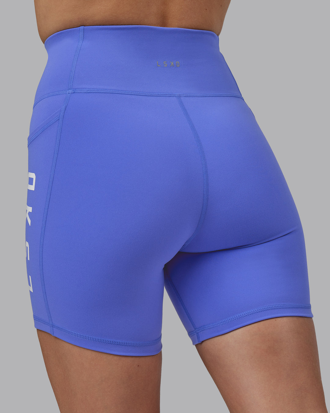 Woman wearing Rep Ultra High-Rise 6" Short Pockets - Baja Blue-White | Model:Lillie | Size:S - view 8