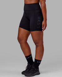 Woman wearing Rep Ultra High-Rise 6" Short Pockets - Black-Black | Model:Sierra | Size:L | Thumbnail Index: 1