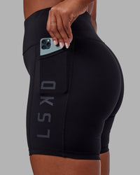 Woman wearing Rep Ultra High-Rise 6" Short Pockets - Black-Black | Model:Sierra | Size:L | Thumbnail Index: 2