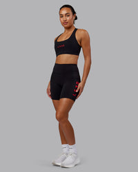 Woman wearing Rep Ultra High-Rise 6" Short Pockets - Black-Scarlet | Model:Demi | Size:S | Thumbnail Index: 5