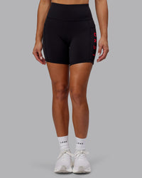 Woman wearing Rep Ultra High-Rise 6" Short Pockets - Black-Scarlet | Model:Demi | Size:S | Thumbnail Index: 7