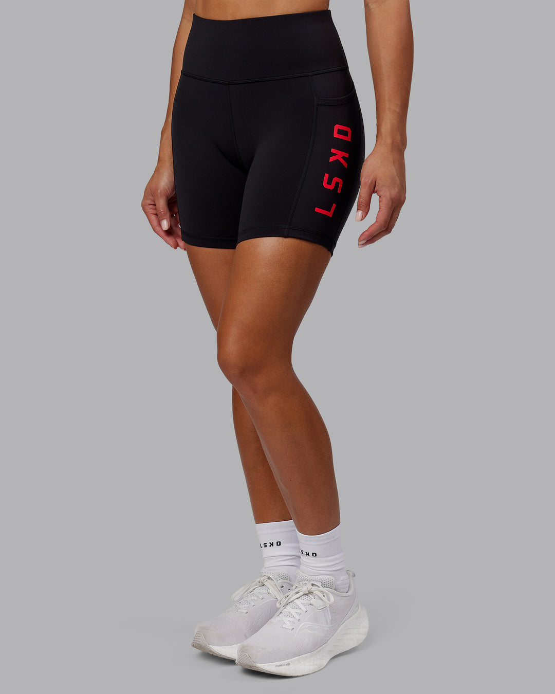 Woman wearing Rep Ultra High-Rise 6" Short Pockets - Black-Scarlet | Model:Demi | Size:S - view 3
