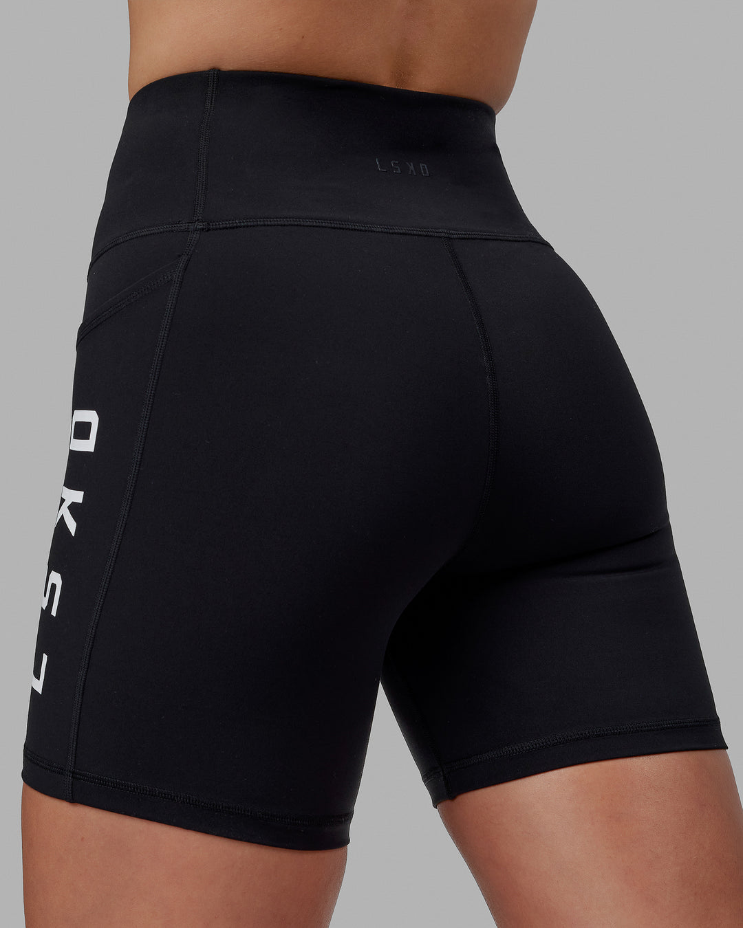 Woman wearing Rep Ultra High-Rise 6" Short Pockets - Black-White | Model:Shae | Size:S - view 4