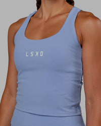 Woman wearing Rep Shelf Bra Performance Tank - Arctic Blue | Thumbnail Index: 6