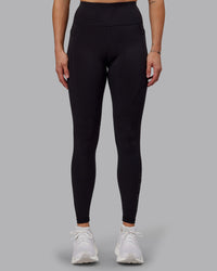 Woman wearing Rep Ultra High-Rise Tall Legging Pockets - Black-Black | Model:Hannah | Size:S | Thumbnail Index: 6