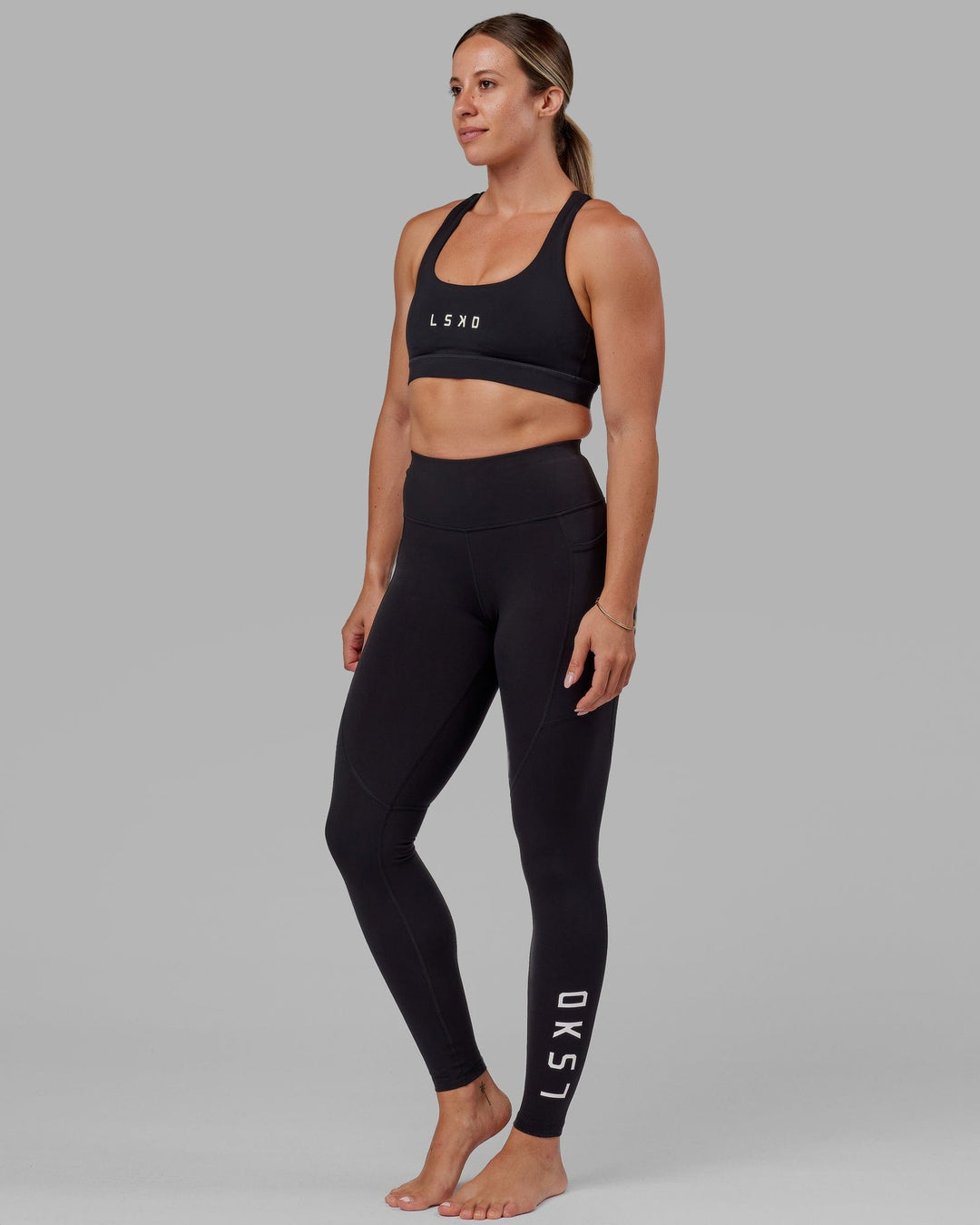 Woman wearing Rep Ultra High-Rise Tall Legging Pockets - Black-White | Model:Bree | Size:S - view 3