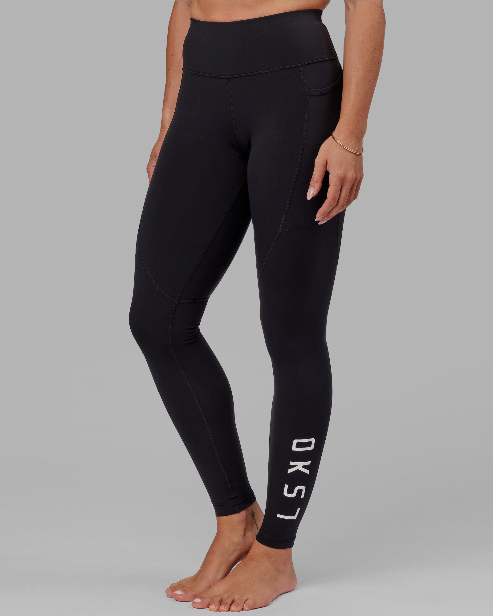 Woman wearing Rep Ultra High-Rise Tall Legging Pockets - Black-White | Model:Bree | Size:S