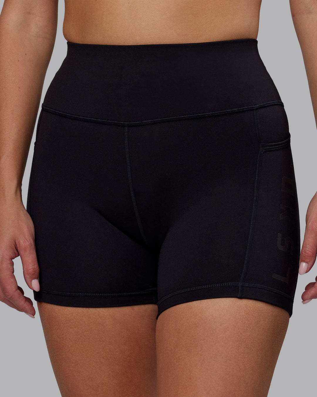 Woman wearing Rep Ultra High-Rise 4" Short Pockets - Black-Black | Model:Lillie | Size:S - view 6