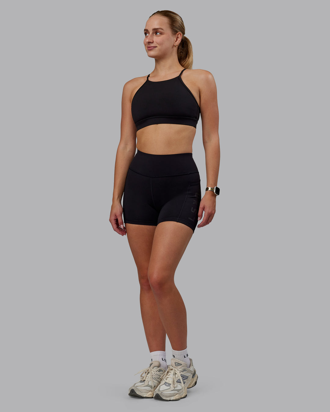 Woman wearing Rep Ultra High-Rise 4" Short Pockets - Black-Black | Model:Lillie | Size:S - view 5