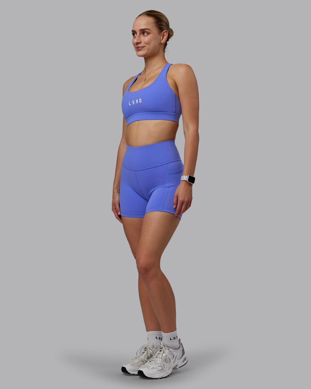 Woman wearing Rep Ultra High-Rise 4" Short Pockets - Baja Blue-White | Model:Lillie | Size:S - view 5