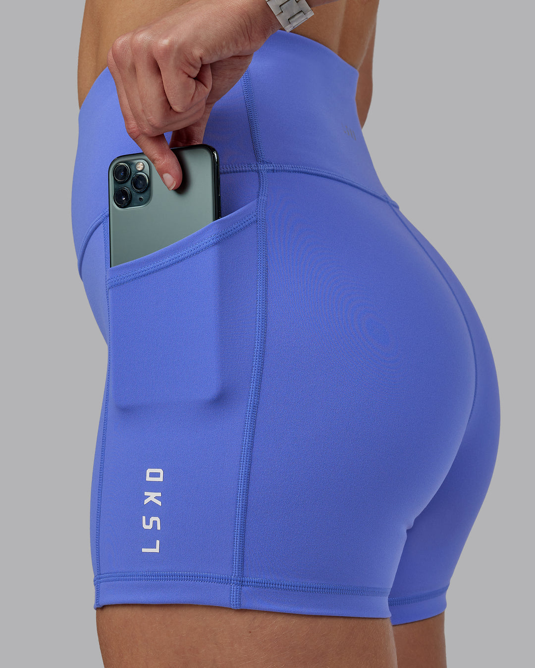 Woman wearing Rep Ultra High-Rise 4" Short Pockets - Baja Blue-White | Model:Lillie | Size:S - view 7