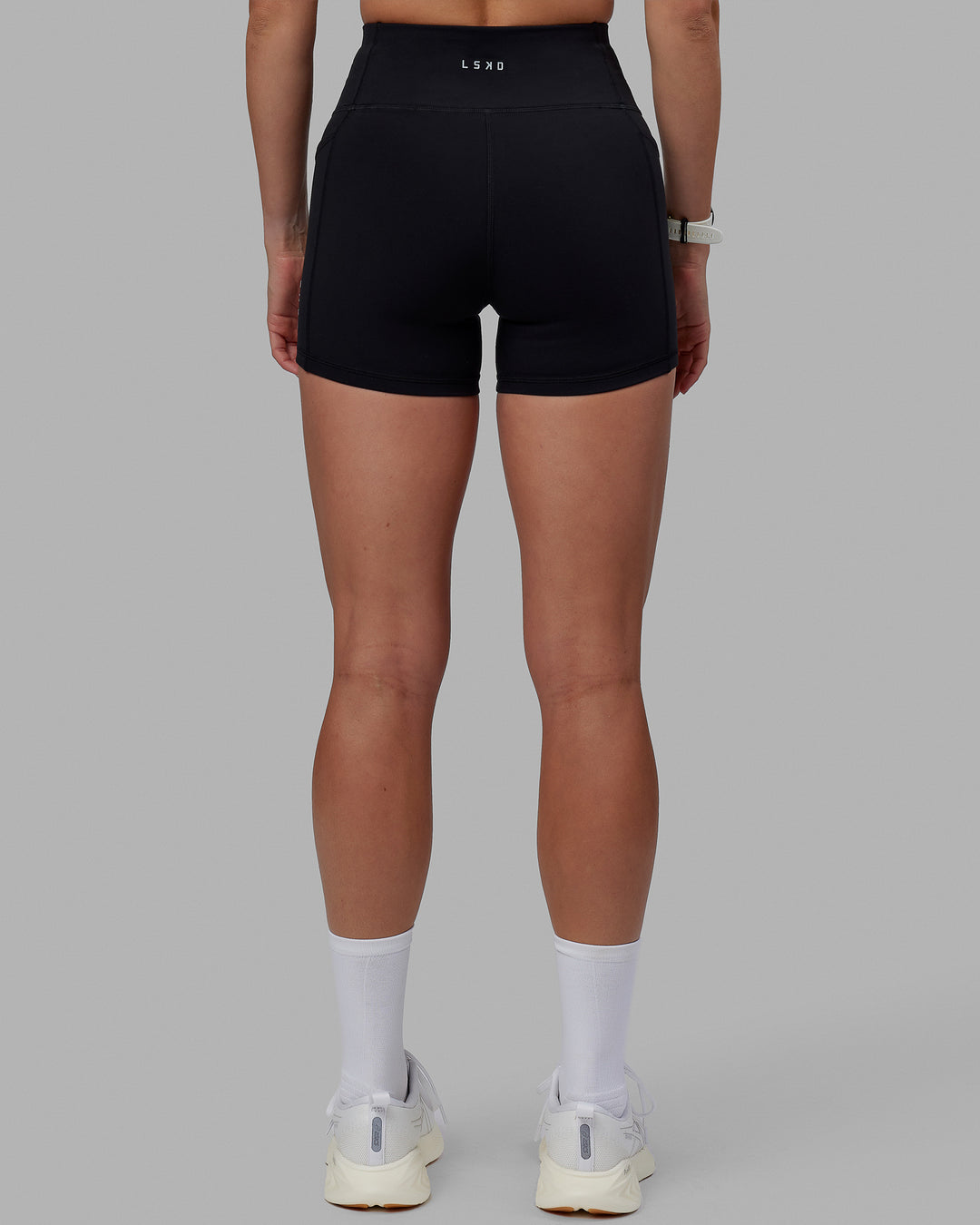 Women wearing O.G. Rep Ultra High-Rise 4" Short Pockets - Black-White | Model:Shae | Size:S - view 4