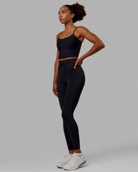 Woman wearing Resistance Ultra High-Rise Full Length Legging - Black | Thumbnail Index: 5