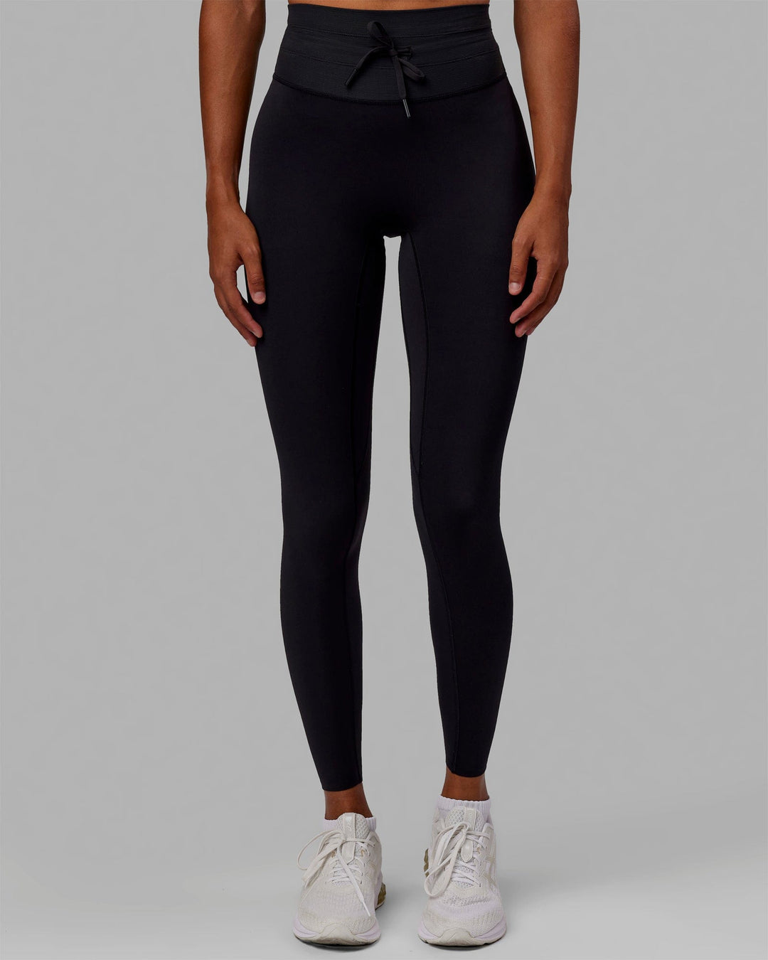 Woman wearing Resistance Ultra High-Rise Full Length Legging - Black - view 2