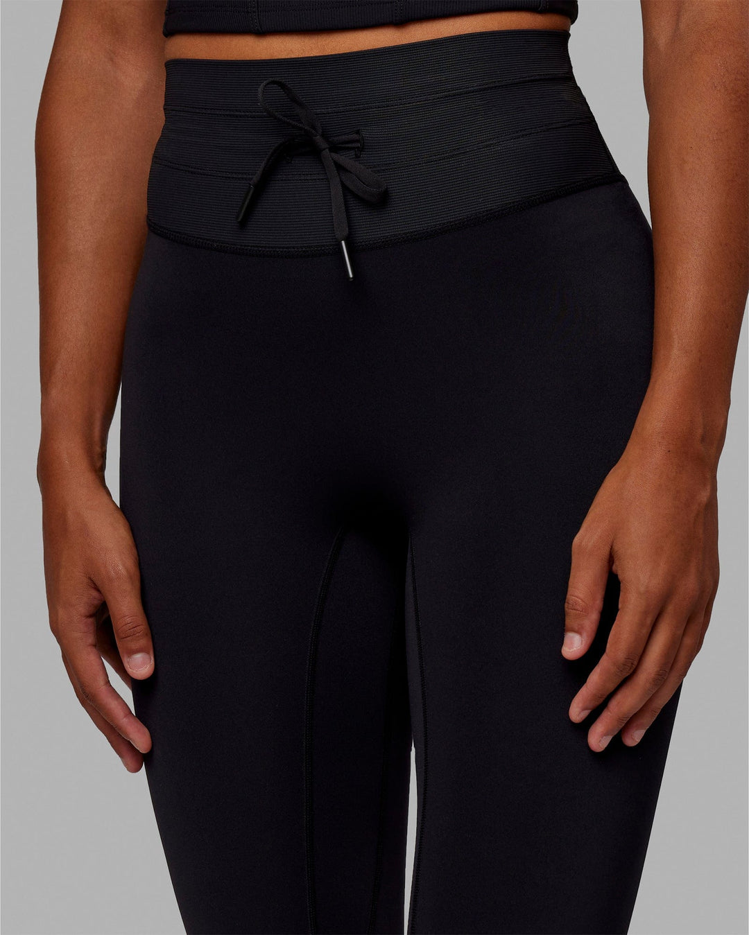 Woman wearing Resistance Ultra High-Rise Full Length Legging - Black - view 3