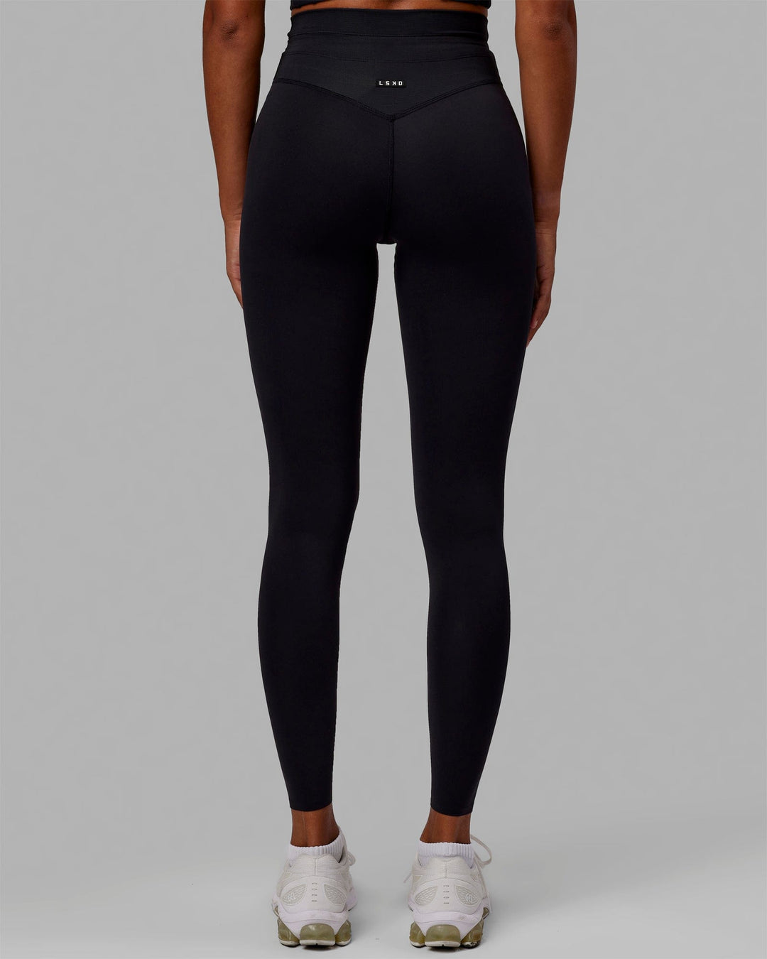 Woman wearing Resistance Ultra High-Rise Full Length Legging - Black - view 4