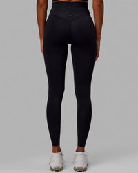 Woman wearing Resistance Ultra High-Rise Full Length Legging - Black | Thumbnail Index: 3