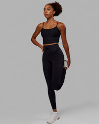 Woman wearing Resistance Ultra High-Rise Full Length Legging - Black | Thumbnail Index: 4