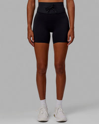 Woman wearing Resistance Ultra High-Rise 6" Short - Black | Thumbnail Index: 2