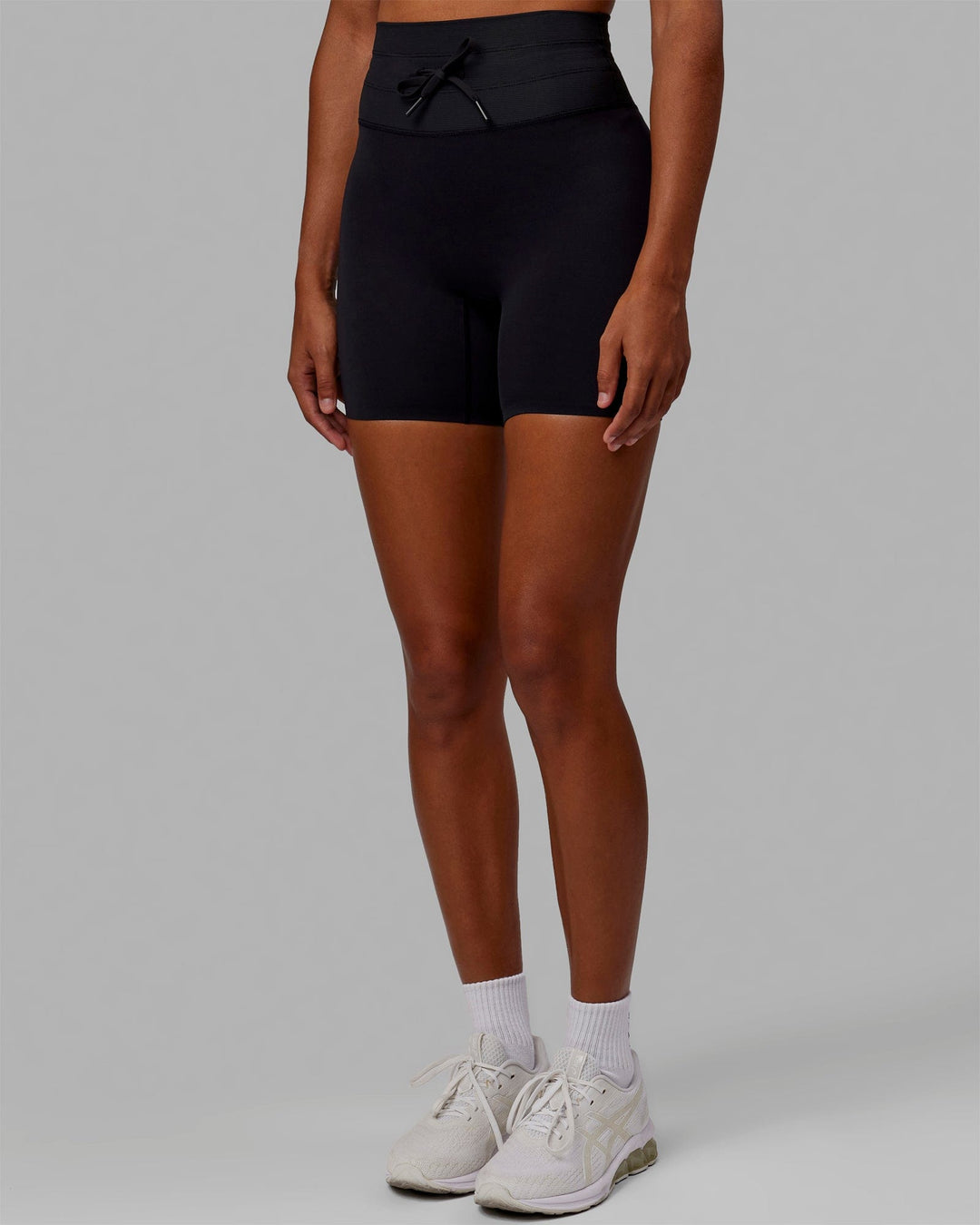 Woman wearing Resistance Ultra High-Rise 6" Short - Black - view 7