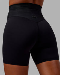 Woman wearing Resistance Ultra High-Rise 6" Short - Black | Thumbnail Index: 4