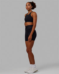 Woman wearing Resistance Ribbed Sports Bra - Black | Thumbnail Index: 2