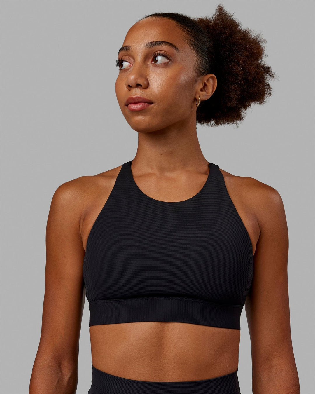 Woman wearing Resistance Ribbed Sports Bra - Black - view 1