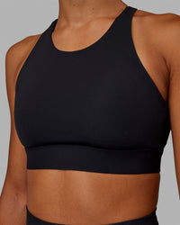 Woman wearing Resistance Ribbed Sports Bra - Black | Thumbnail Index: 3