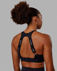 Woman wearing Resistance Ribbed Sports Bra - Black | Thumbnail Index: 5