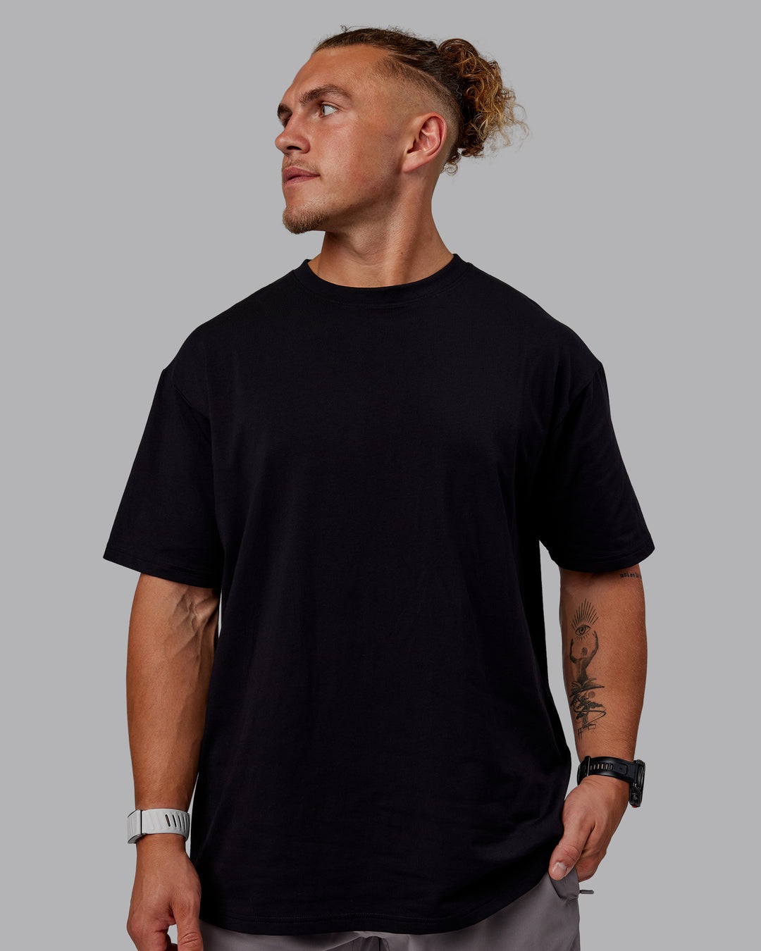 Man wearing Sara GET ÆTLA SKAL Unisex FLXCotton Tee Oversize - Black-White - view 4