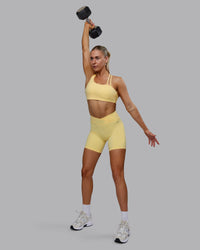Woman wearing Sara Helios Sports Bra - Sunflower | Thumbnail Index: 9