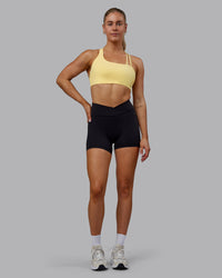 Woman wearing Sara Helios Sports Bra - Sunflower | Thumbnail Index: 11