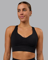 Woman wearing Sculpt Sports Bra - Black | Thumbnail Index: 2