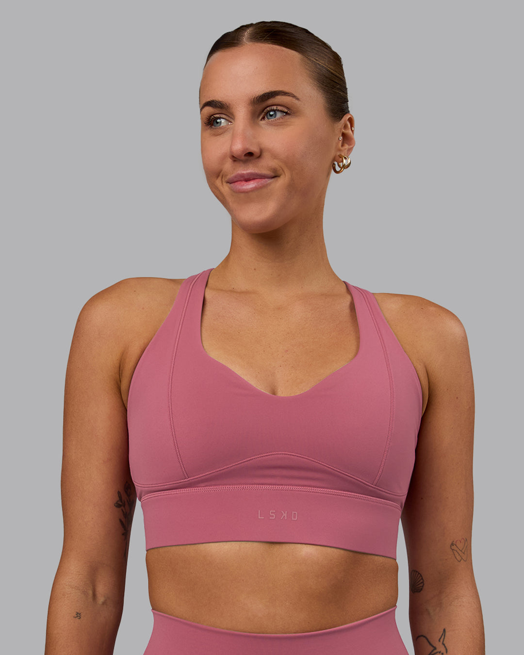Woman wearing Sculpt Sports Bra - Mauve Haze - view 4