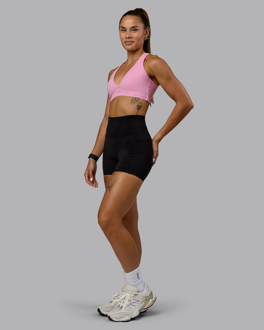 Woman wearing Stamina Sports Bra - Bubblegum - view 3