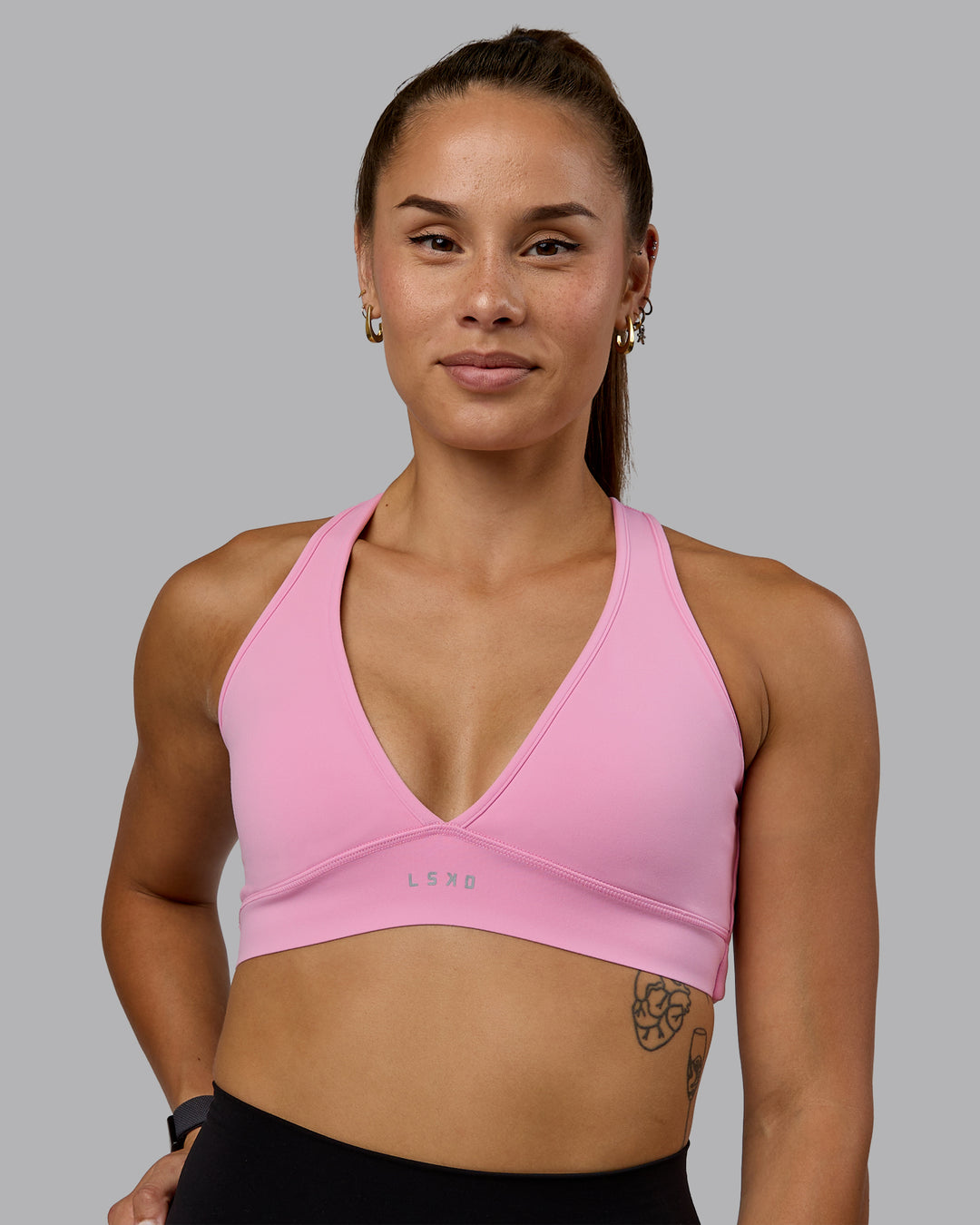 Woman wearing Stamina Sports Bra - Bubblegum - view 2