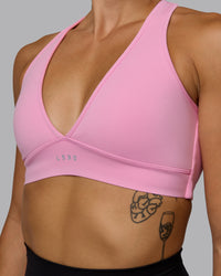 Woman wearing Stamina Sports Bra - Bubblegum | Thumbnail Index: 3