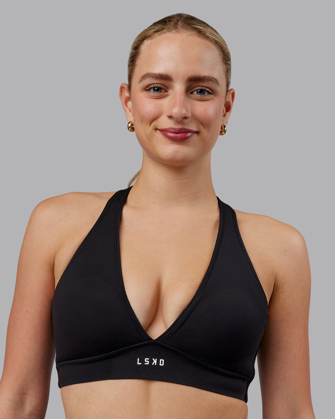 Woman wearing Stamina Sports Bra (D/DD/E) - Black | Model:Lillie | Size:S - view 6