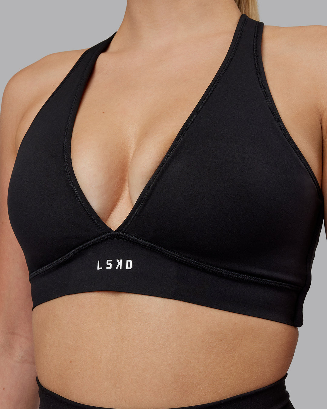 Woman wearing Stamina Sports Bra (D/DD/E) - Black - view 9