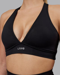 Woman wearing Stamina Sports Bra (D/DD/E) - Black | Thumbnail Index: 8