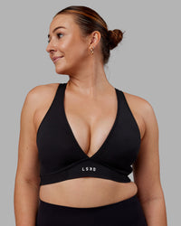 Woman wearing Stamina Sports Bra (D/DD/E) - Black | Model:Tegan | Size:M | Thumbnail Index: 0