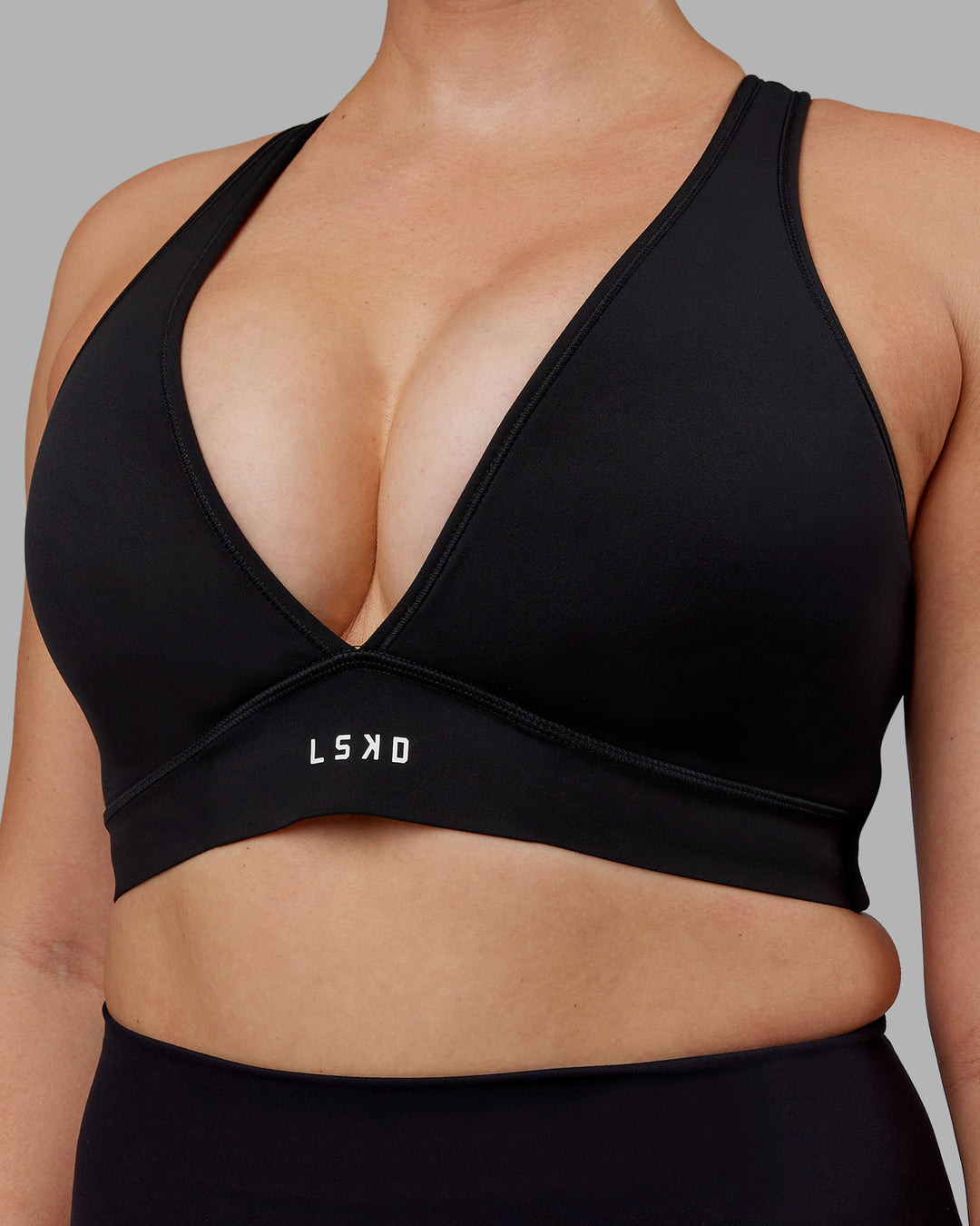 Woman wearing Stamina Sports Bra (D/DD/E) - Black - view 5