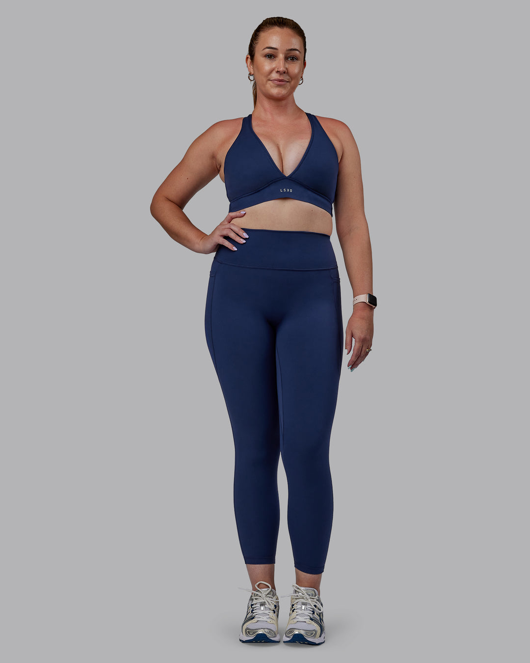 Woman wearing Stamina Sports Bra -(D/DD/E) - Future Navy | Model:Tegan | Size:M - view 3