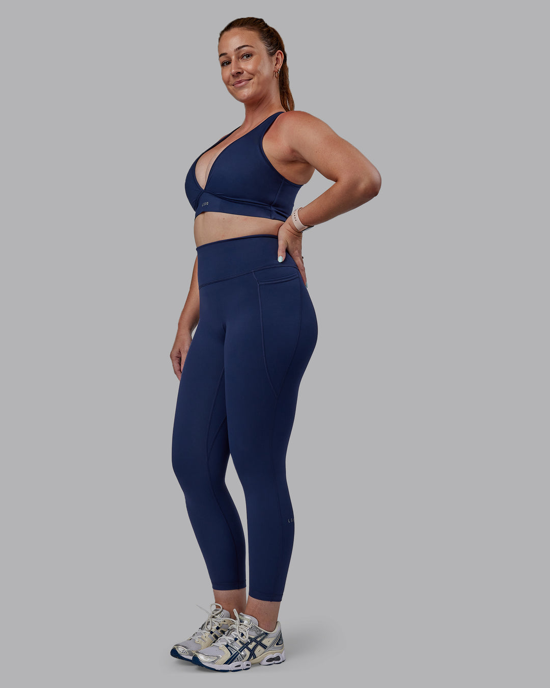 Woman wearing Stamina Sports Bra -(D/DD/E) - Future Navy | Model:Tegan | Size:M - view 5