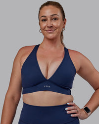 Woman wearing Stamina Sports Bra -(D/DD/E) - Future Navy | Model:Tegan | Size:M | Thumbnail Index: 0