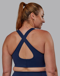 Woman wearing Stamina Sports Bra -(D/DD/E) - Future Navy | Model:Tegan | Size:M | Thumbnail Index: 1