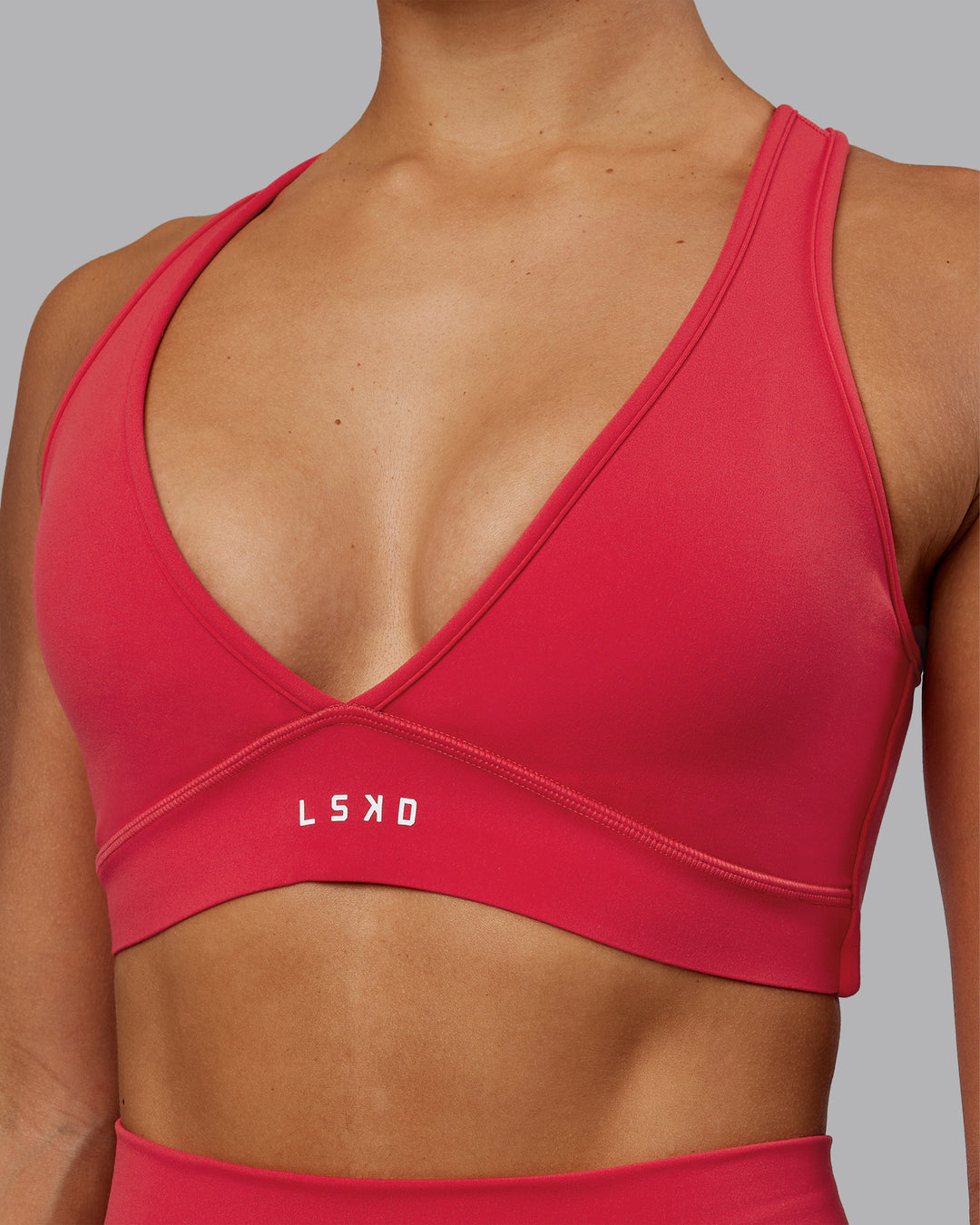 Woman wearing Stamina Sports Bra in Scarlet | Size:S - view 6